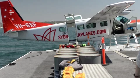 Passengers about to board sea plane Stock-Footage 59644175