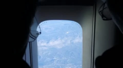 Passengers in airplane looking from the window 스톡 동영상 12467271