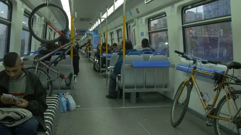 Passengers and bicycles in a Wagon Train Stock Footage 81457018
