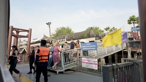 The passengers are getting on and off to the Chao Phraya Express Boat Stock-Footage 301356623