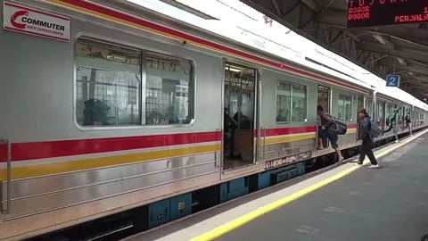 Passengers are getting on the electric train Stock Footage 157086629