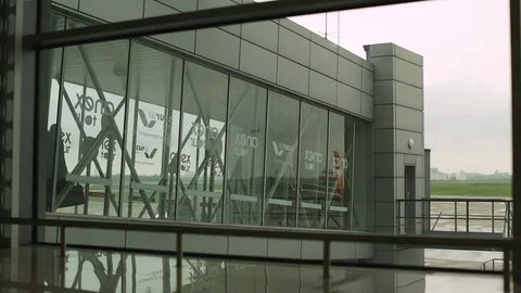 Passengers are going to board the plane at the airport terminal Video stock 123666253