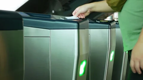 Passengers are going through automatic entrance ticket gate door to the tra.. 스톡 동영상 273215282