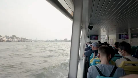 The passengers are taking the Chao Phraya Express Boat to the next location. 動画素材 301358706