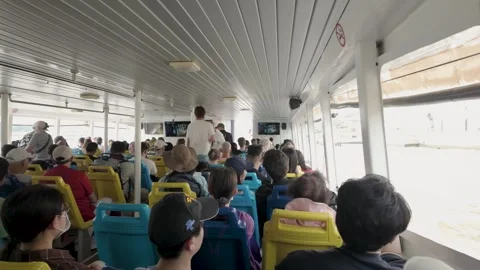The passengers are taking the Chao Phraya Express Boat to the next location. 動画素材 301539746
