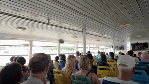 The passengers are taking the Chao Phraya Express Boat to the next location. 動画素材 314348613