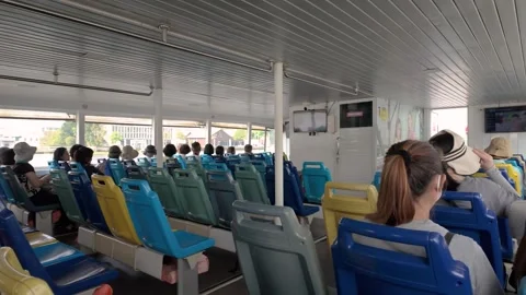 The passengers are taking the Chao Phraya Express Boat to the next location. 動画素材 319978795
