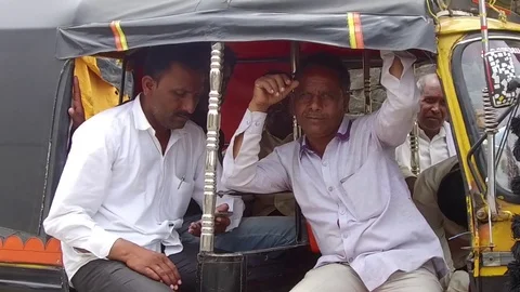 Passengers in the auto rickshaw Stock Footage 77571985