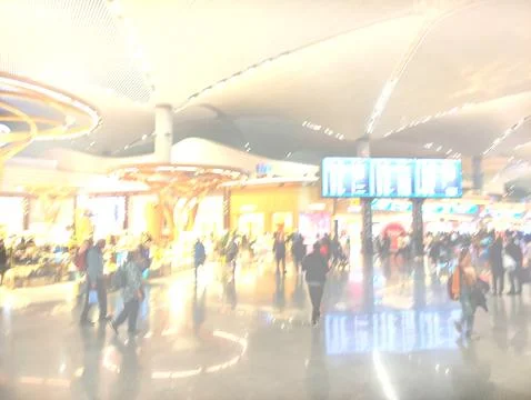 Passengers in the blur hall with timetable Stock Photos
