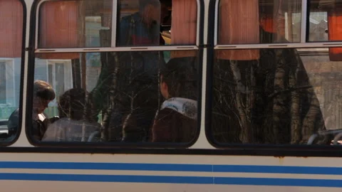 Passengers board the bus at a stop in a small Siberian village. Stock Footage 245145212