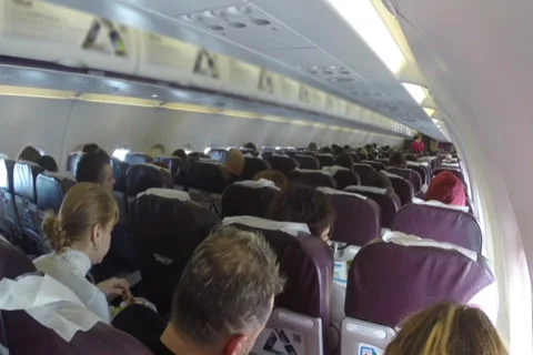 Passengers on board during flight, airplane interior long flying, click for HD Stock-Footage 43967791