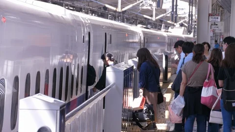 Passengers Board Shinkansen (Bullet Train) (2) - Japan Stock Footage 95912432
