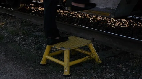 Passengers board a Train using a small Stool Stock Footage 92648516