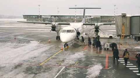 Passengers boarding an airplane Stock Footage 71054755