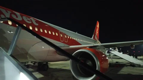 Passengers boarding Easy Jet Flight Malta 13th Nov 2021 Stock Footage 169454689