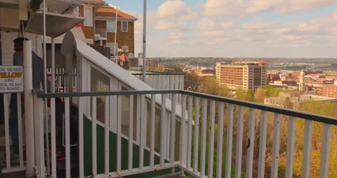 Passengers Boarding Fenelon Place Elevator with Dubuque Skyline in View, Iowa Stock Footage 340274744