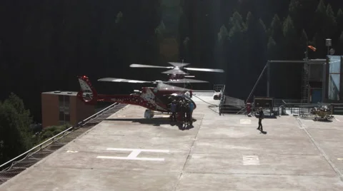 Passengers boarding helicopter Stock Footage 58913297