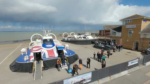Passengers boarding hovercraft at Ryde, Isle of Wight terminal Stock Footage 238543285