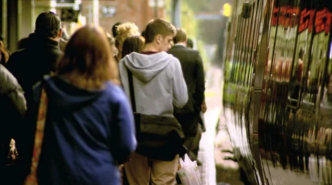 Passengers boarding a train Stock Footage 37615519