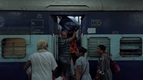 Passengers boarding at the train in Haridwar. Stock Footage 163355511