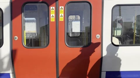 Passengers Boarding Underground Train Putney Bridge London 4K Video stock 332651704