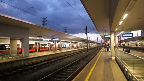 Passengers boarding the Westbahn train arriving at Linz main station Stockbeeldmateriaal 219256019