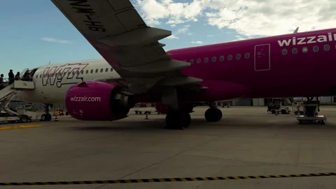 Passengers Boarding a Wizz Air Plane at Treviso Airport in Italy 스톡 동영상 346189745