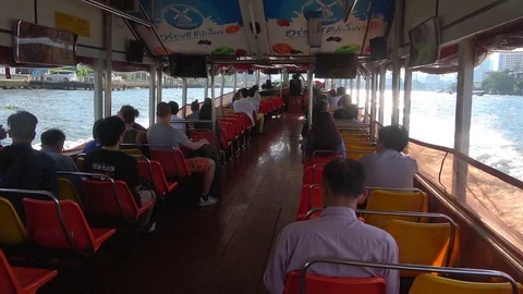 Passengers of a boat floating on the Chao Phraya river. Bangkok, Thailand Stock Footage 129280500