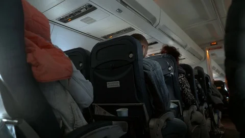 Passengers in the cabin. Side view. 4k Stock Footage 98186566