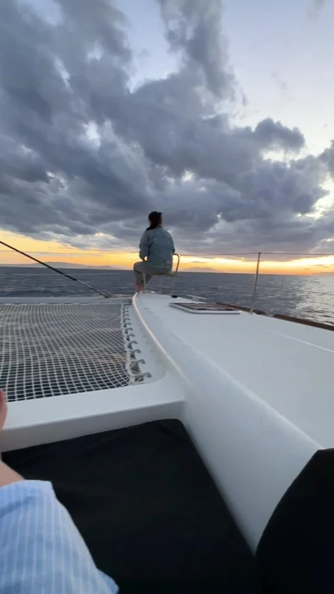 Passengers on Catamaran Deck During Sailing Trip in Greece Stock Footage 336964954