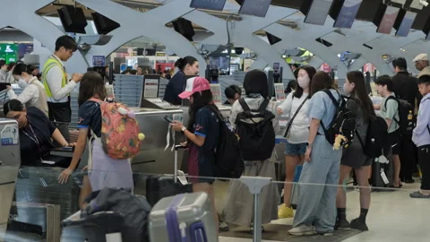 Passengers at check in counters in airport Stock Footage 333102982