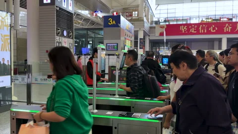 Passengers checking-in for boarding high-speed bullet train Stock Footage 290484762