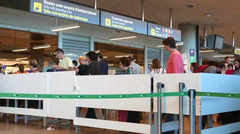 Passengers checking in at the security line at the Valencia, Spain Airport. Stock Footage 62340021