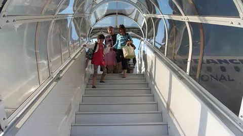 Passengers Coming Off Plane Stock Footage 11883042