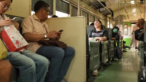 Passengers Commuting on a Local Train in Bangkok Thailand Video stock 328207947