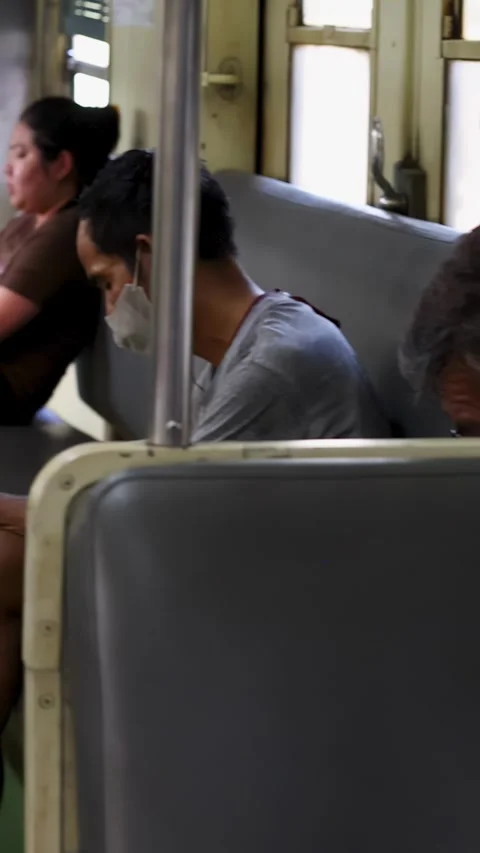 Passengers Commuting on a Local Train in Bangkok Thailand Video stock 328693756
