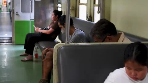 Passengers Commuting on a Public Train in Bangkok Thailand Video stock 328064220