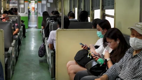 Passengers Commuting on a Public Train in Bangkok Thailand Video stock 328207894