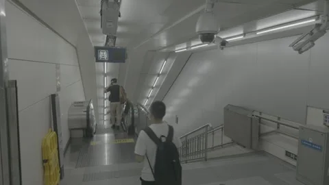 Passengers Descend Stairs Inside Beijing Subway Station 스톡 동영상 341457165