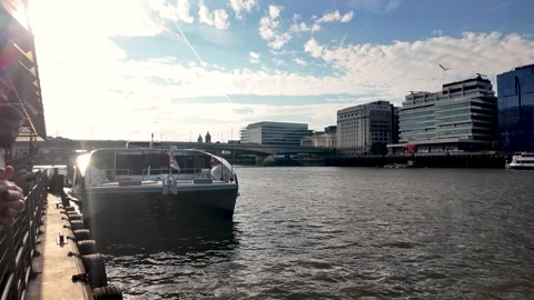 Passengers disembarking from a Thames Clipper boat on the River Thames in Stock Footage 341358217