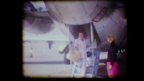 Passengers Exiting Airplane from Tail Munich 1965 Stock Footage 279847973
