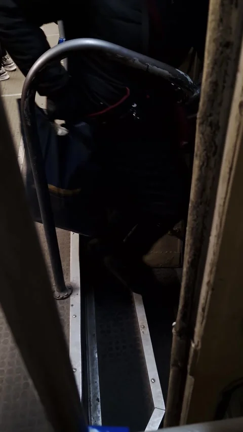 Passengers Exiting An Old Tram Through Interior Stairwell Stock Footage 326061034