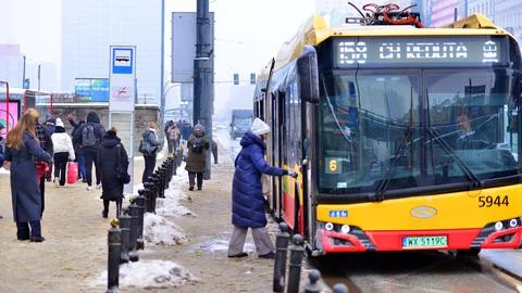 Passengers get on and off the bus Stock Photos