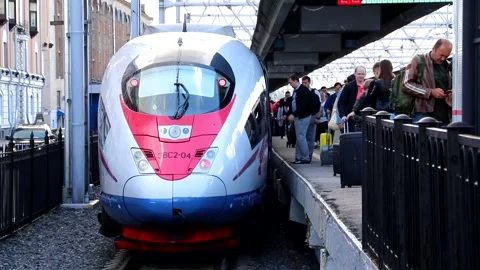 Passengers get off the train. Passengers get out of the peregrine Falcon Video stock 141078151
