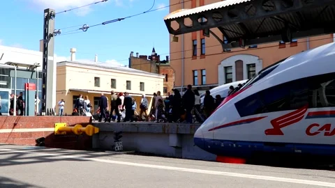 Passengers get off the train. Passengers get out of the peregrine Falcon Video stock 141078196