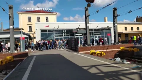 Passengers get off the train. Passengers get out of the peregrine Falcon Video stock 150365548