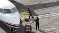 Passengers Getting off Aircraft HD Footage