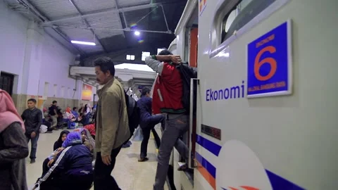 Passengers Getting Off A Train in Bandung Train Station Stock Footage 132220364