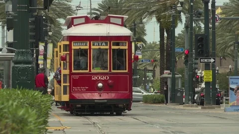 Passengers getting into tram at the tram stop Stock Footage 84634477