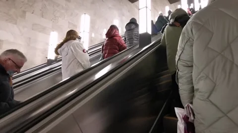Passengers go up and down the escalator in the Moscow metro. Stock Footage 169273339